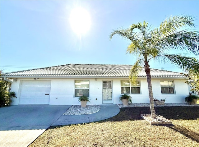 view of front of home with a garage