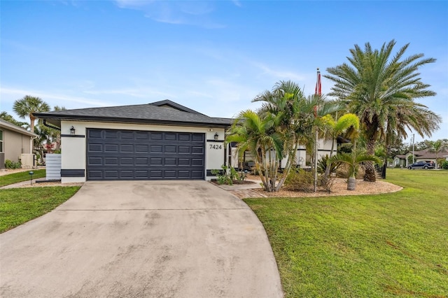 ranch-style home with a garage and a front lawn