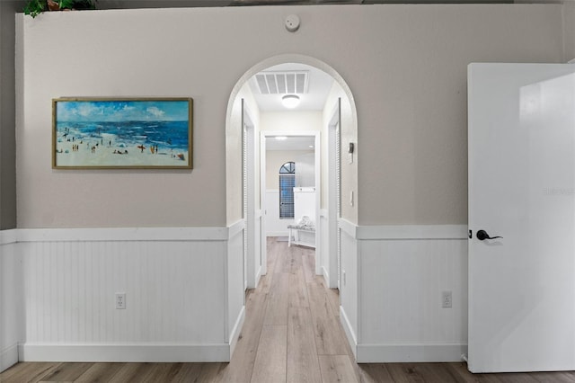 corridor featuring light hardwood / wood-style flooring