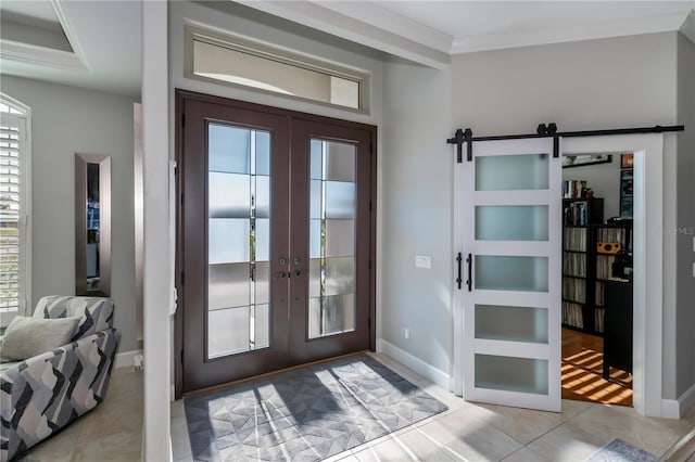 doorway to outside with french doors, ornamental molding, and light tile patterned floors