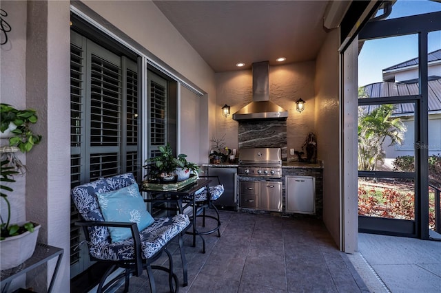 view of patio / terrace with exterior kitchen and area for grilling