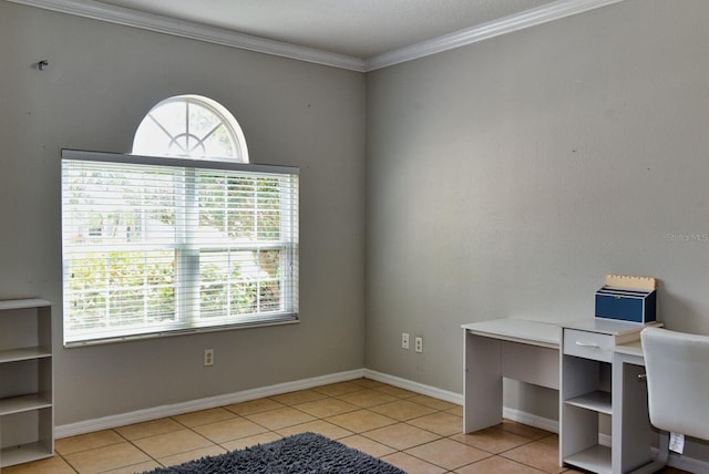 office area featuring light tile patterned floors, baseboards, and crown molding