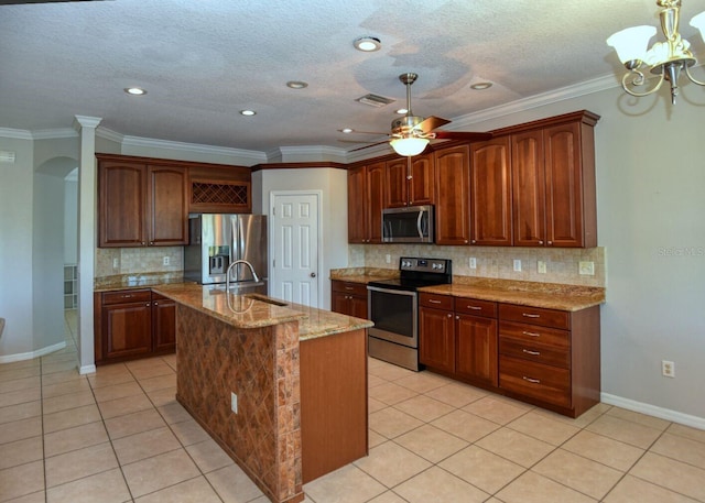 kitchen featuring light stone countertops, visible vents, light tile patterned flooring, arched walkways, and appliances with stainless steel finishes