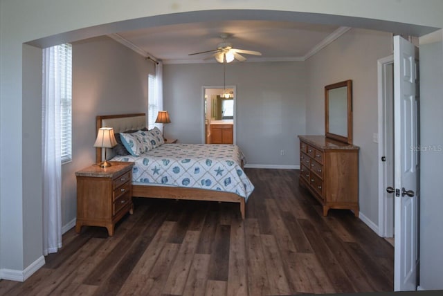 bedroom featuring arched walkways, dark wood finished floors, baseboards, and ornamental molding