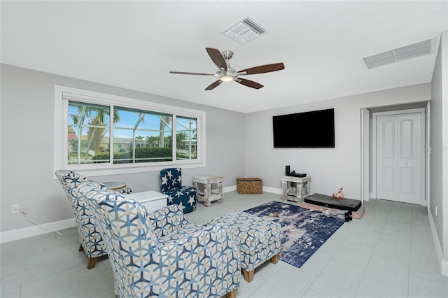 living room featuring ceiling fan