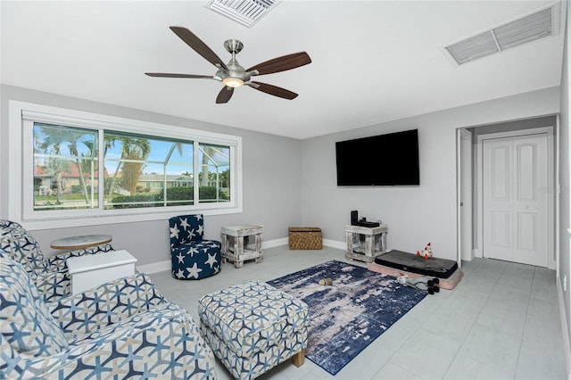 living room with ceiling fan