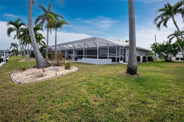 view of yard featuring glass enclosure