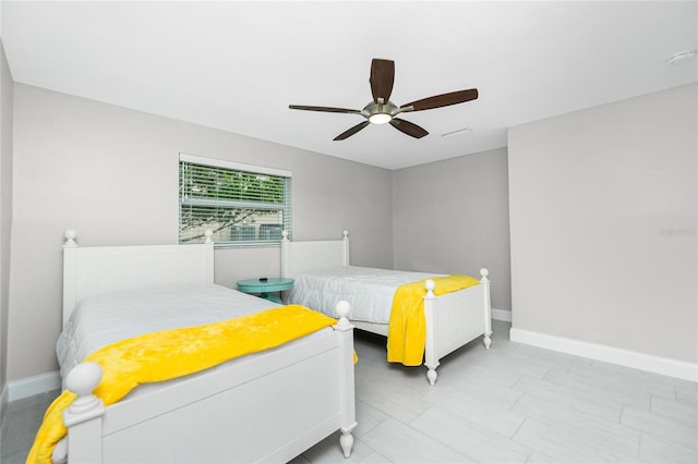 bedroom featuring ceiling fan