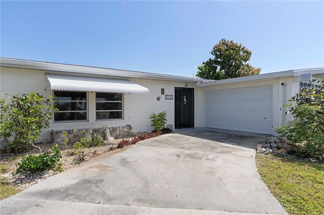 ranch-style house with a garage