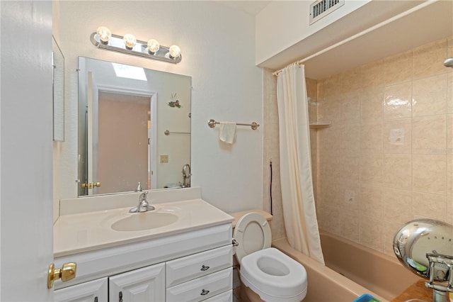 full bathroom with vanity, shower / bathtub combination with curtain, and toilet