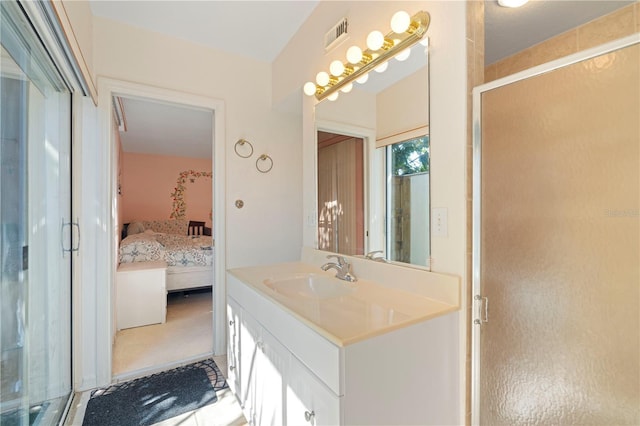 bathroom featuring vanity and walk in shower