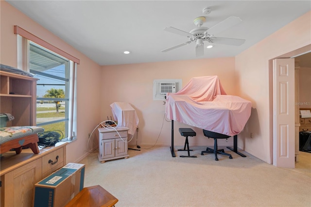 office with ceiling fan, light colored carpet, and a wall mounted AC