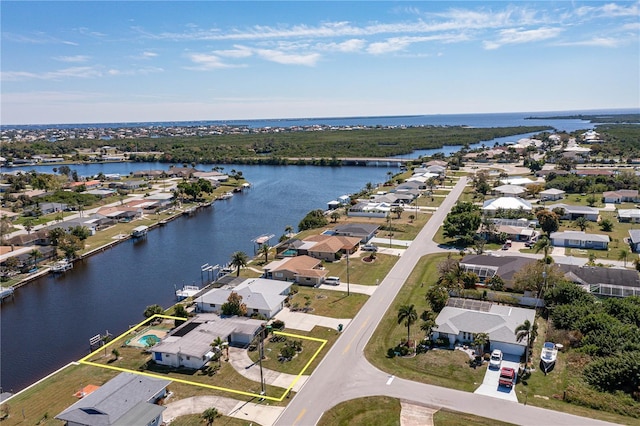 drone / aerial view featuring a water view