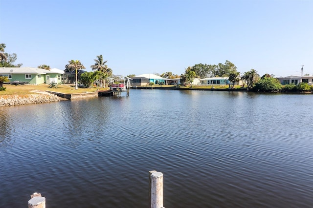 property view of water featuring a boat dock