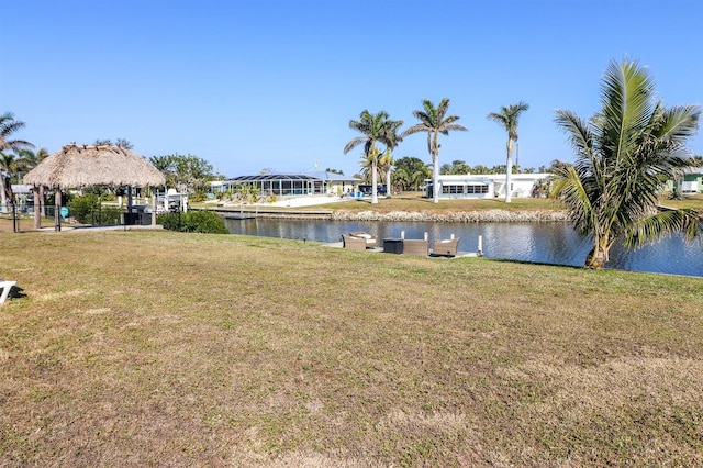 view of yard with a gazebo and a water view