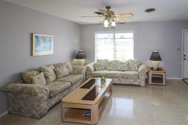 living room featuring ceiling fan