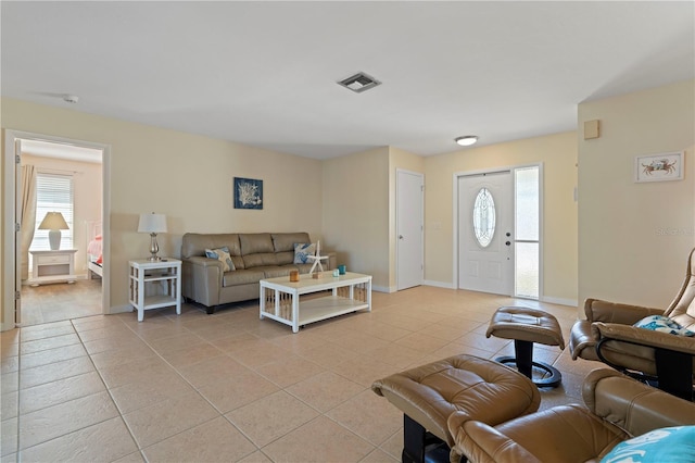 living room with light tile patterned flooring