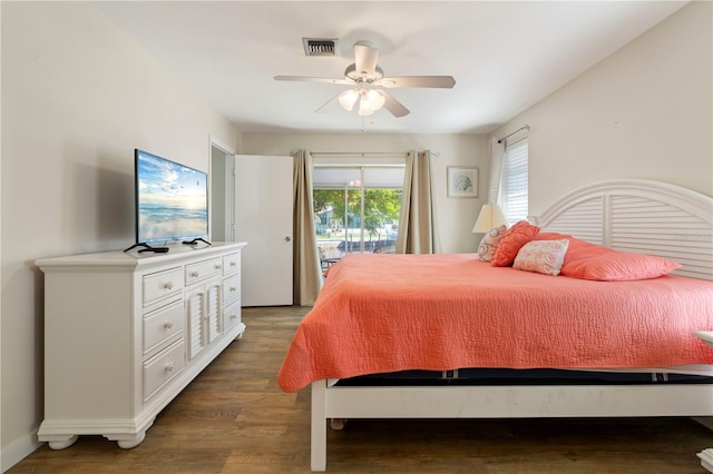 bedroom with access to outside, ceiling fan, and dark hardwood / wood-style flooring