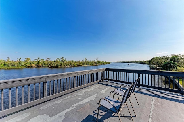 view of patio featuring a water view