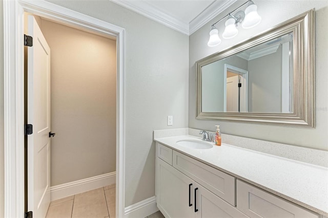 bathroom featuring vanity, tile patterned flooring, and ornamental molding