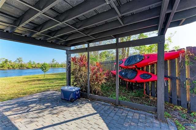 view of patio featuring a water view