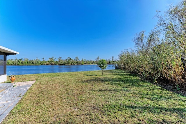 view of yard with a water view