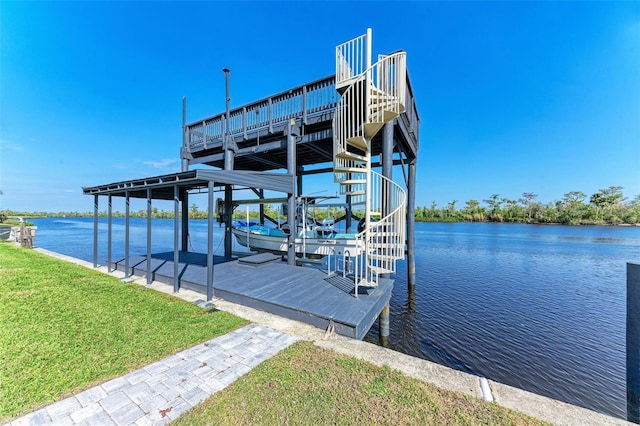 dock area featuring a yard and a water view