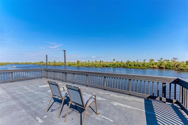 view of patio / terrace featuring a water view