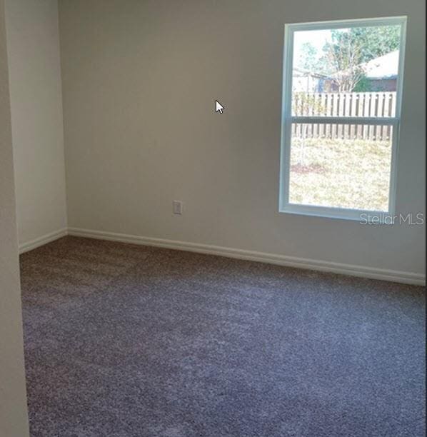 view of carpeted empty room