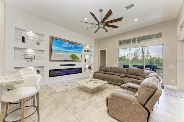 living room with ceiling fan