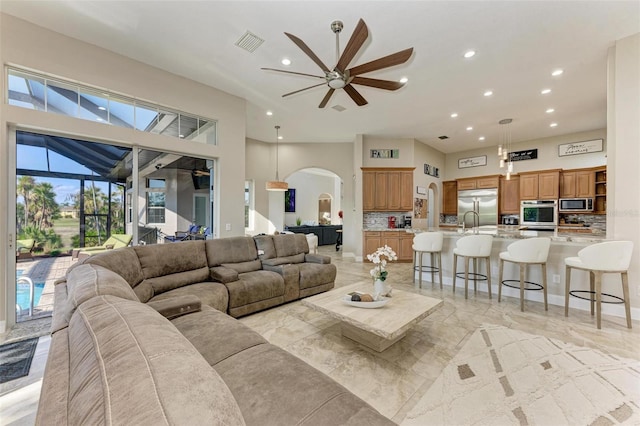 living room with ceiling fan