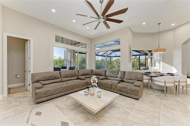 living room with ceiling fan