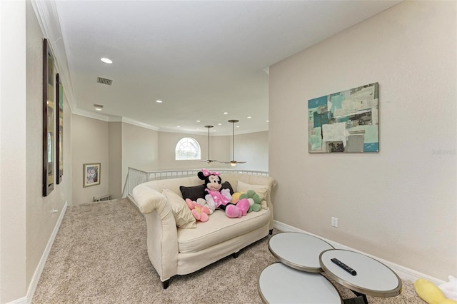 interior space featuring light carpet and crown molding