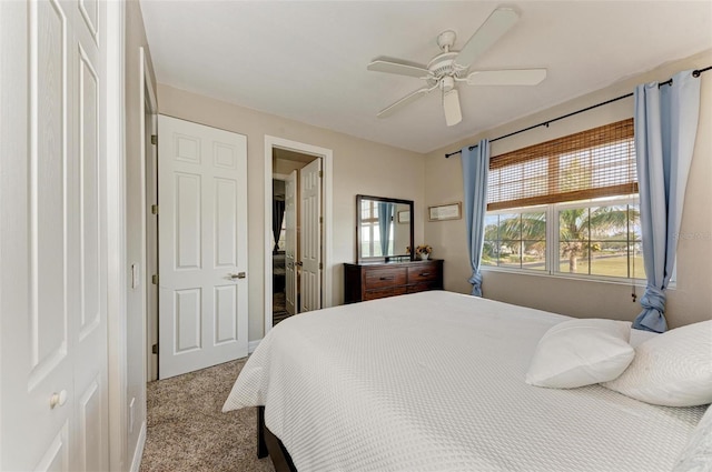 carpeted bedroom with ceiling fan