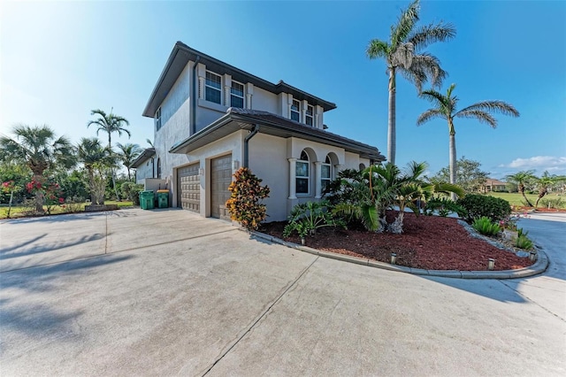 view of property exterior featuring a garage