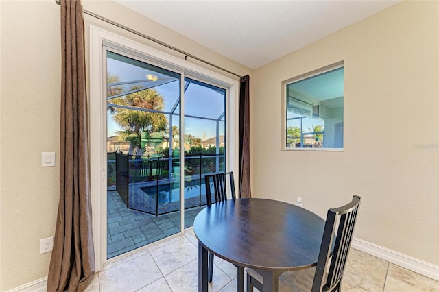 dining area with light tile patterned floors