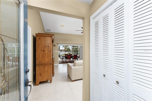 corridor with light tile patterned floors