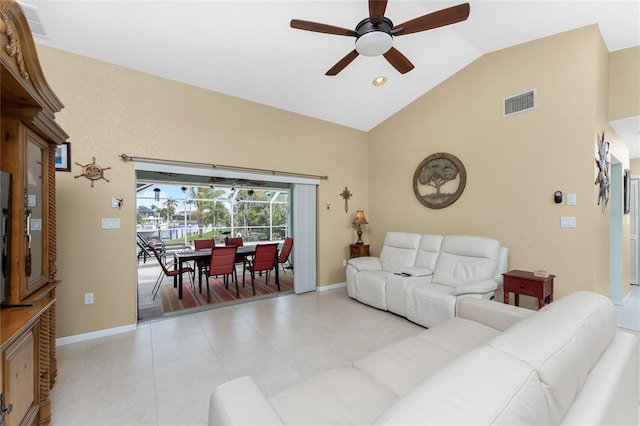 living room with ceiling fan and lofted ceiling