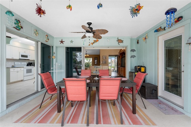 dining space featuring ceiling fan