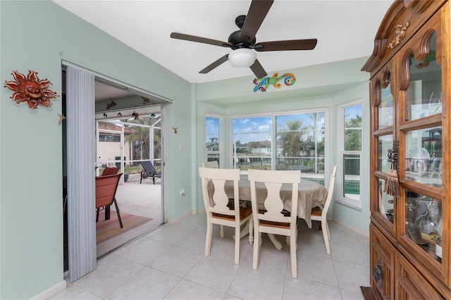 sunroom / solarium with ceiling fan