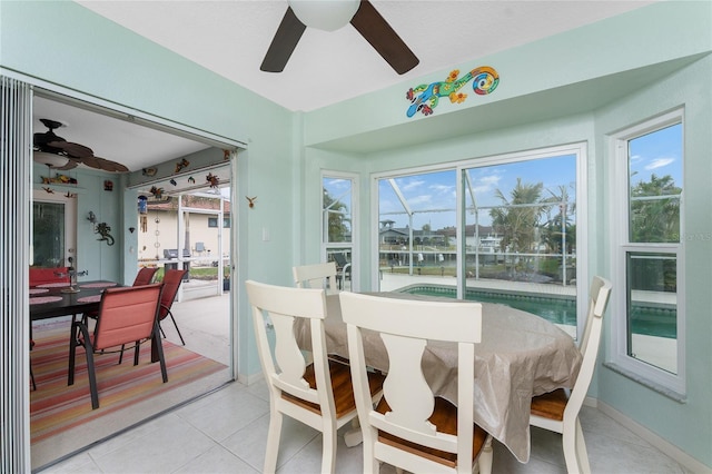 sunroom / solarium featuring french doors