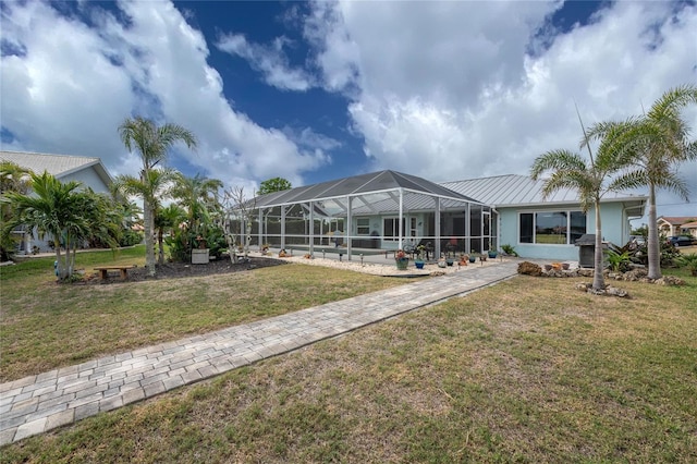 view of community featuring a yard and a pool