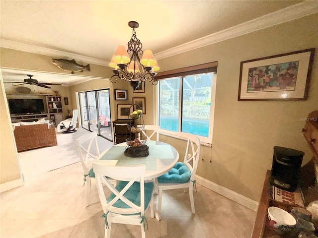 dining area featuring ceiling fan with notable chandelier and ornamental molding