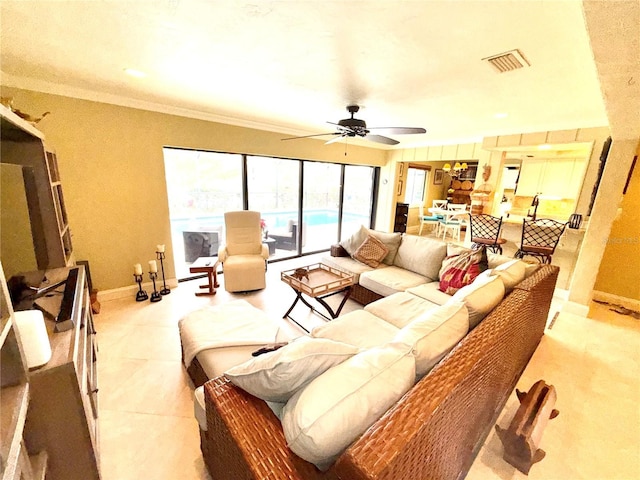 living room featuring ceiling fan and ornamental molding