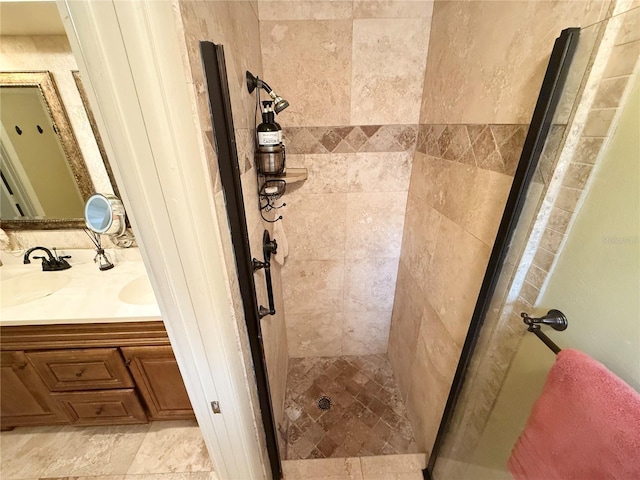 bathroom with vanity and an enclosed shower