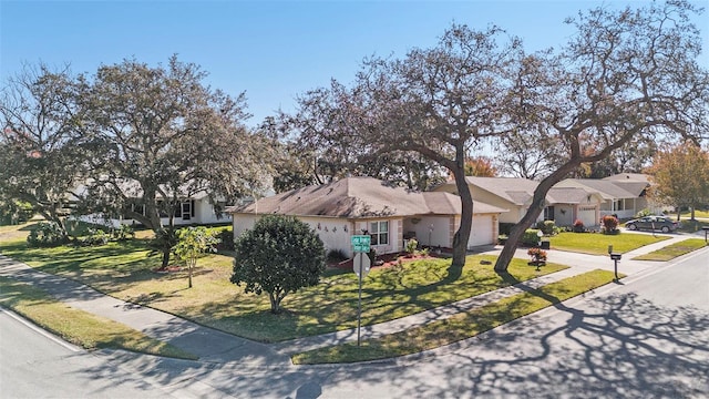 view of front of home with a front lawn