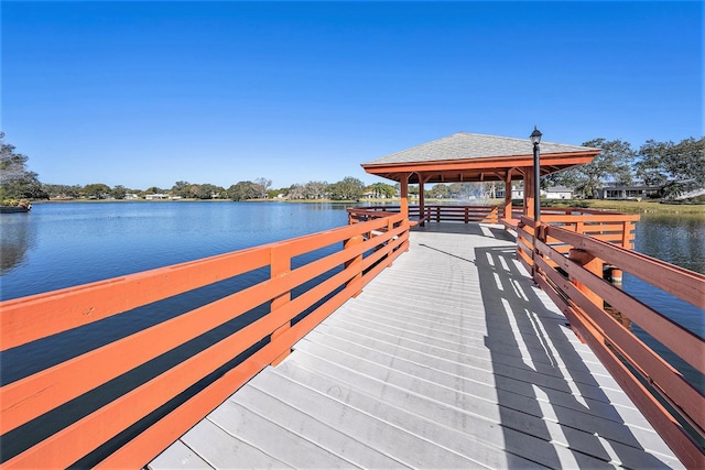 dock area featuring a gazebo and a water view