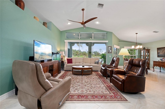 living room with light tile patterned floors, ceiling fan with notable chandelier, and high vaulted ceiling