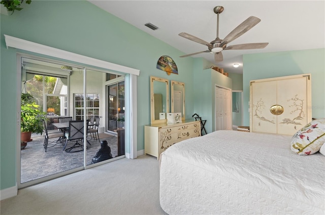 carpeted bedroom with access to outside, ceiling fan, and a closet