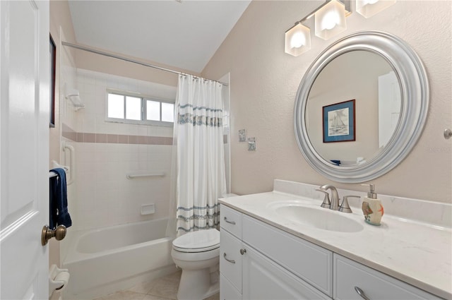 full bathroom with vanity, vaulted ceiling, tile patterned flooring, toilet, and shower / bath combo with shower curtain